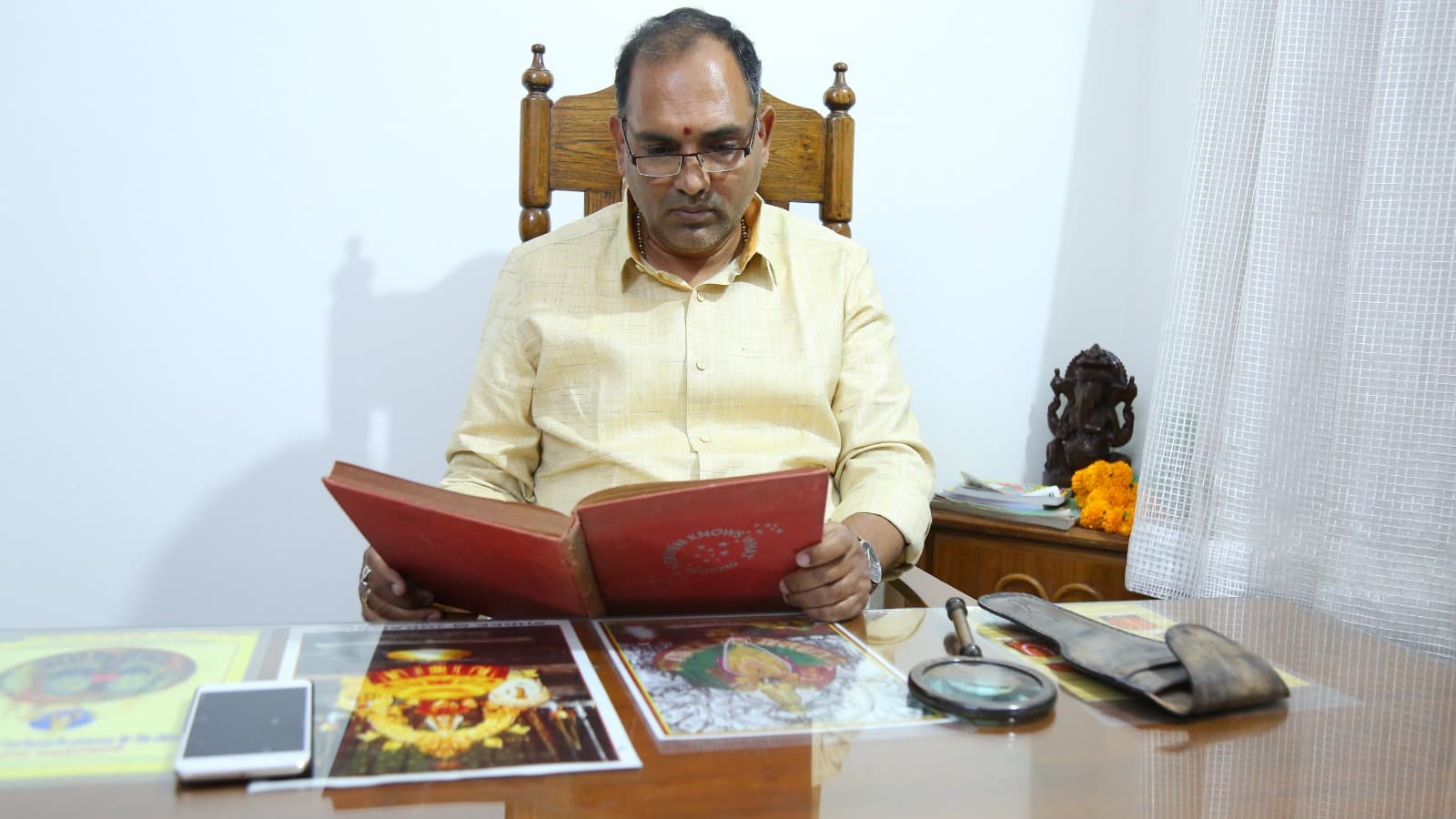 Acharya Rathnam studying Vedic texts